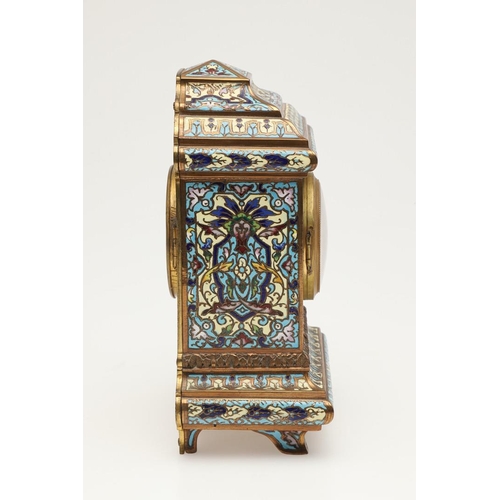 377 - AN EARLY 20TH CENTURY FRENCH GILT METAL AND CHAMPLEVE ENAMEL CLOCK. the white enamel dial painted wi... 