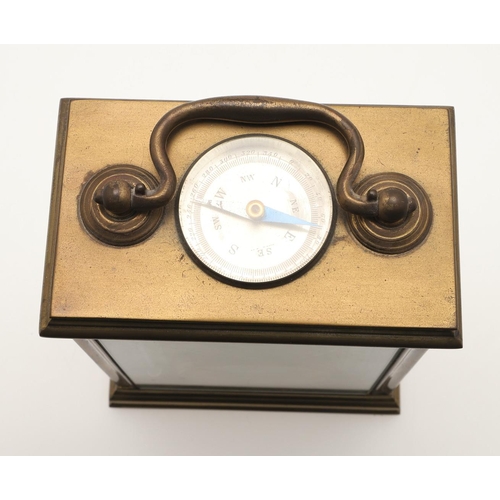 379 - A LATE 19TH CENTURY BRASS CARRIAGE COMBINATION TIMEPIECE. comprising of compass, clock and aneroid b... 