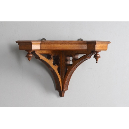 381 - A SUBSTANTIAL GOTHIC OAK CHIMING BRACKET CLOCK AND BRACKET. 19th century, the 7 3/4