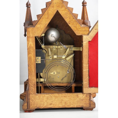 381 - A SUBSTANTIAL GOTHIC OAK CHIMING BRACKET CLOCK AND BRACKET. 19th century, the 7 3/4