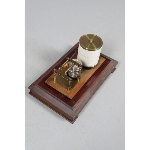 394 - AN ARMY AND NAVY MAHOGANY CASED BAROGRAPH. early 20th century, with ink bottle and spare charts to t... 