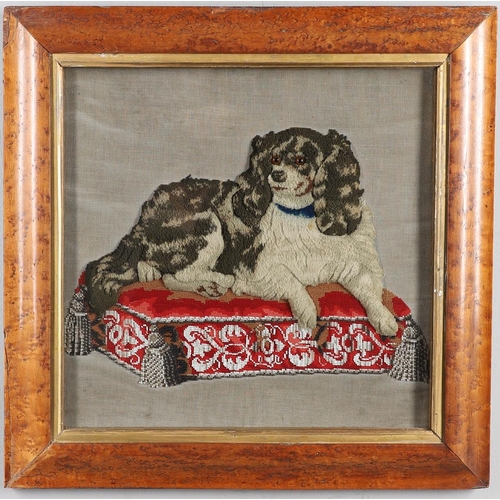 407 - A 19TH CENTURY RAISED WOOLWORK AND BEADED PICTURE. depicting a King Charles Spaniel lying upon a bea... 