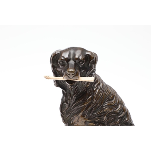 414 - A 19TH CENTURY BRONZE OF A SEATED SPANIEL WITH HINGED JAW. upon a hardstone base, height 16cm, width... 