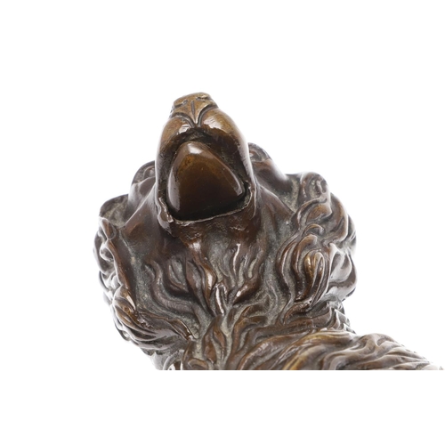 414 - A 19TH CENTURY BRONZE OF A SEATED SPANIEL WITH HINGED JAW. upon a hardstone base, height 16cm, width... 