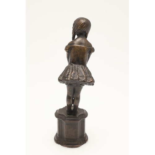 416 - PHOEBE STABLER (1879-1955) BRONZE OF A YOUNG GIRL. modelled with ringlets and wearing a pleated dres... 