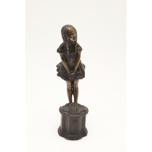 416 - PHOEBE STABLER (1879-1955) BRONZE OF A YOUNG GIRL. modelled with ringlets and wearing a pleated dres... 