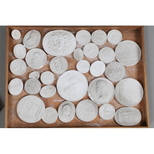 427 - A 19TH CENTURY CHEST OF PLASTER INTAGLIOS. the five drawers containing approximately 100 intaglios, ... 