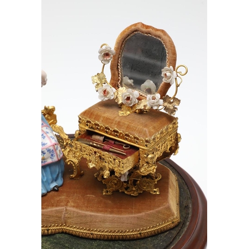 428 - AN UNUSUAL PORCELAIN FIGURE & GILT METAL DRESSING TABLE SEWING SET. 19th century, comprising of a se... 