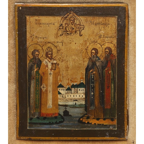 433 - A 19TH CENTURY RUSSIAN ICON. illustrating four Saints, tempera and gilt leaf on wood panel, 13.5cm x... 