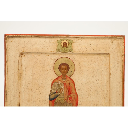 434 - A 19TH CENTURY RUSSIAN ICON - SAINT JOHN THE WARRIOR. tempera on wood with gold leaf, bearing paper ... 