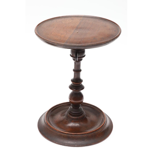 436 - A PAIR OF VICTORIAN ROSEWOOD CANDLE STANDS. with adjustable tops, turned stems and bases, height 21c... 