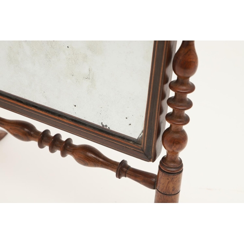 438 - A MID-19TH CENTURY ROSEWOOD MINIATURE SWING MIRROR. the arched plate with hanging ring to a boxwood ... 