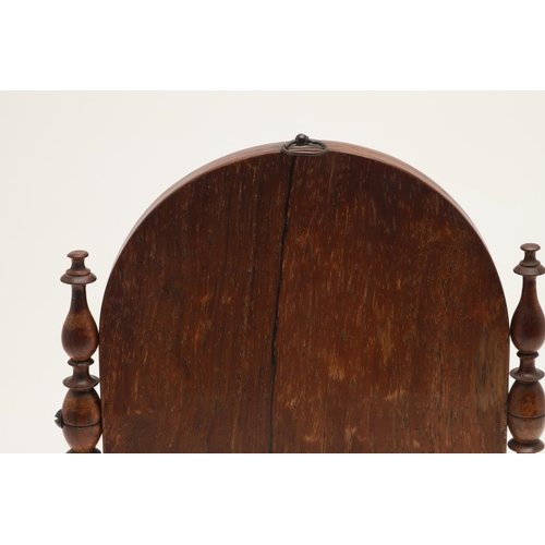 438 - A MID-19TH CENTURY ROSEWOOD MINIATURE SWING MIRROR. the arched plate with hanging ring to a boxwood ... 