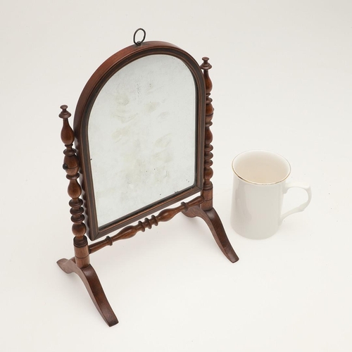 438 - A MID-19TH CENTURY ROSEWOOD MINIATURE SWING MIRROR. the arched plate with hanging ring to a boxwood ... 