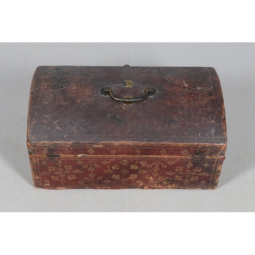 439 - A GEORGE III LEATHER COVERED DOCUMENTS TRAVEL TRUNK. embossed  with gilt crowns and foliate scroll d... 