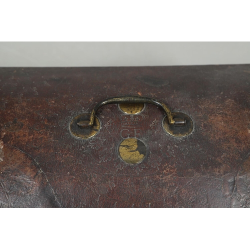 439 - A GEORGE III LEATHER COVERED DOCUMENTS TRAVEL TRUNK. embossed  with gilt crowns and foliate scroll d... 