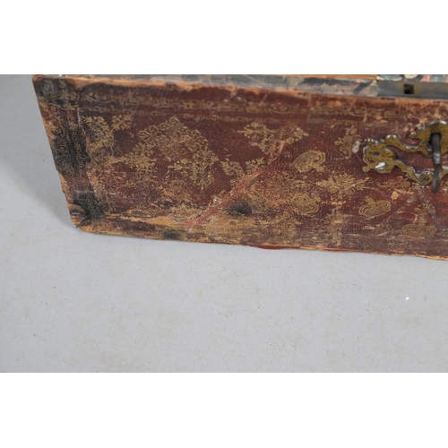 439 - A GEORGE III LEATHER COVERED DOCUMENTS TRAVEL TRUNK. embossed  with gilt crowns and foliate scroll d... 