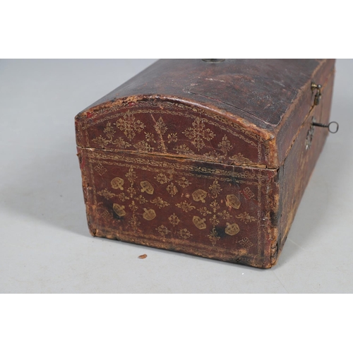 439 - A GEORGE III LEATHER COVERED DOCUMENTS TRAVEL TRUNK. embossed  with gilt crowns and foliate scroll d... 