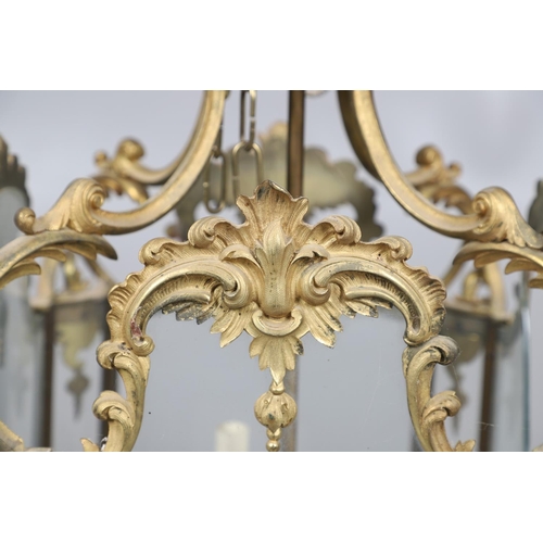 448 - A LARGE FRENCH GILT METAL HALL LANTERN, OF LOUIS XV STYLE, CIRCA 1900. of octagonal form, the glass ... 