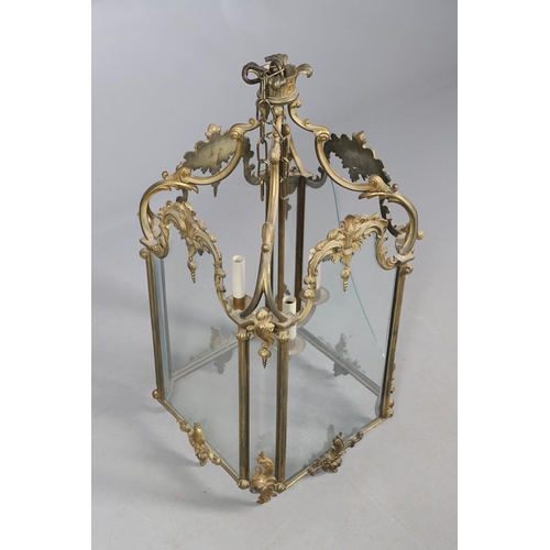 448 - A LARGE FRENCH GILT METAL HALL LANTERN, OF LOUIS XV STYLE, CIRCA 1900. of octagonal form, the glass ... 