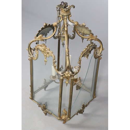 448 - A LARGE FRENCH GILT METAL HALL LANTERN, OF LOUIS XV STYLE, CIRCA 1900. of octagonal form, the glass ... 