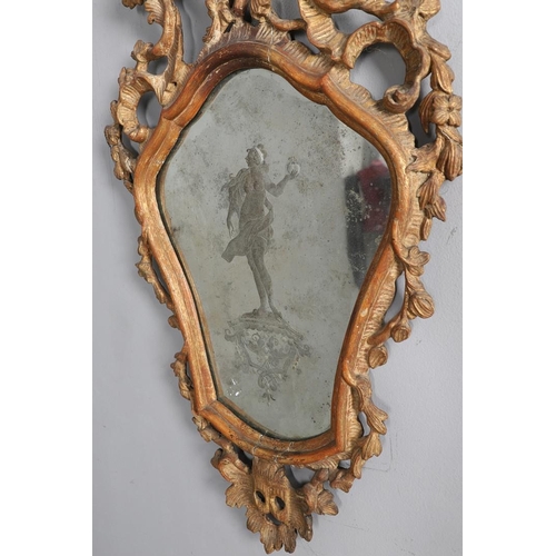 449 - A PAIR OF 18TH CENTURY VENETIAN GILTWOOD WALL MIRRORS. each glass panes etched with central semi-cla... 