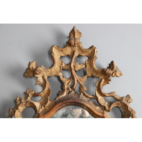 449 - A PAIR OF 18TH CENTURY VENETIAN GILTWOOD WALL MIRRORS. each glass panes etched with central semi-cla... 