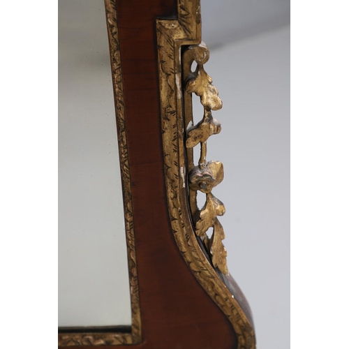 451 - A GEORGE II MAHOGANY OVERMANTLE MIRROR. with gilt gesso inner border and carved giltwood floral deta... 