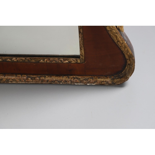 451 - A GEORGE II MAHOGANY OVERMANTLE MIRROR. with gilt gesso inner border and carved giltwood floral deta... 