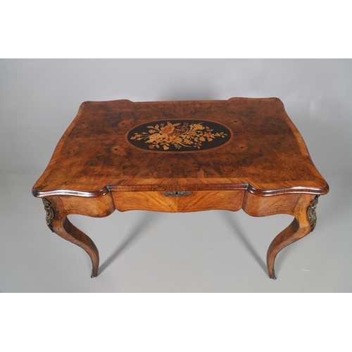 454 - A LOUIS XV STYLE BURR WALNUT AND MARQUETRY BUREAU PLAT. late 19th century, the shaped top with oval ... 