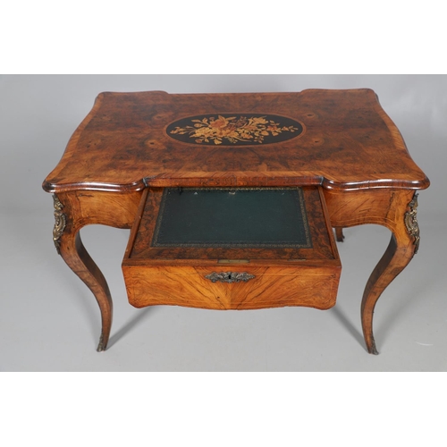 454 - A LOUIS XV STYLE BURR WALNUT AND MARQUETRY BUREAU PLAT. late 19th century, the shaped top with oval ... 