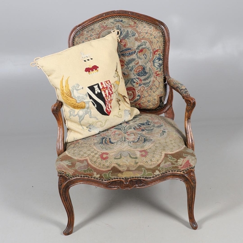 458 - AN EARLY 19TH CENTURY FRENCH WALNUT FAUTEUIL. the frame with scroll arms and serpentine seat, brass ... 