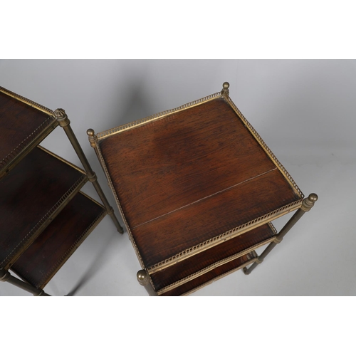 460 - A NEAR PAIR OF ROSEWOOD AND GILT METAL ETARGES. 19th century, each with three brass galleried tiers ... 