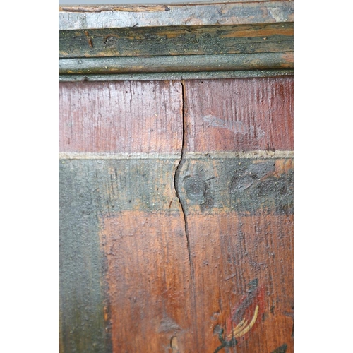 462A - A MID-19TH CENTURY TYROLEAN PROVINCIAL PAINTED PINE ARMOIRE. of canted form with drawer to the base,... 