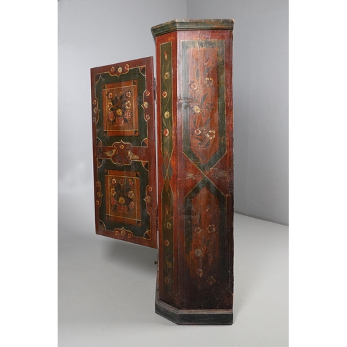 462A - A MID-19TH CENTURY TYROLEAN PROVINCIAL PAINTED PINE ARMOIRE. of canted form with drawer to the base,... 