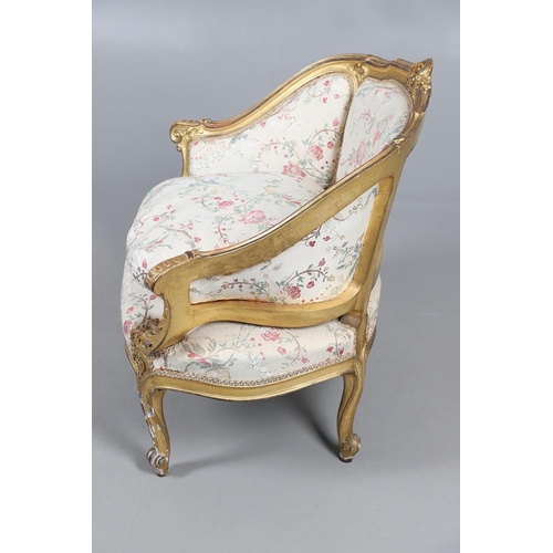 462 - A FRENCH ROCOCO STYLE GILT GESSO TUB CHAIR. of wide proportions, late 19th/early 20th century, the s... 