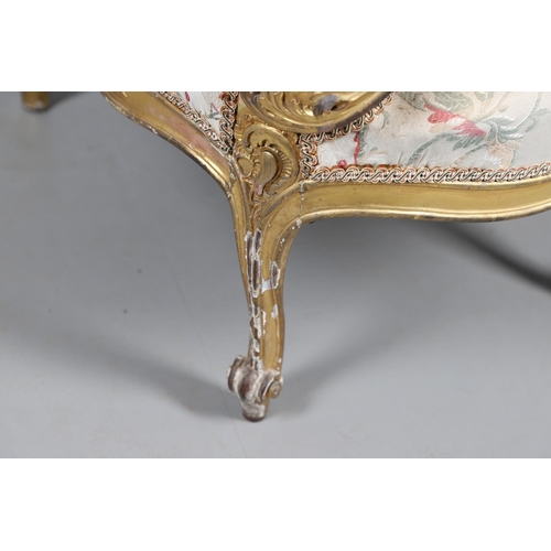 462 - A FRENCH ROCOCO STYLE GILT GESSO TUB CHAIR. of wide proportions, late 19th/early 20th century, the s... 