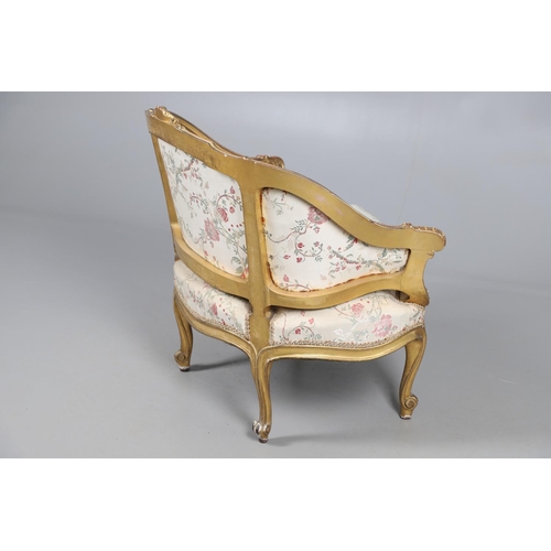 462 - A FRENCH ROCOCO STYLE GILT GESSO TUB CHAIR. of wide proportions, late 19th/early 20th century, the s... 