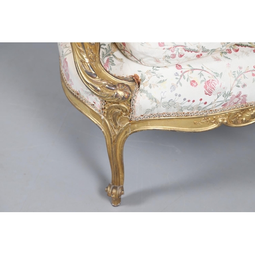 462 - A FRENCH ROCOCO STYLE GILT GESSO TUB CHAIR. of wide proportions, late 19th/early 20th century, the s... 