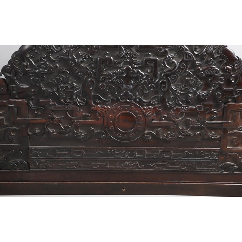 463 - AN EARLY 20TH CENTURY CHINESE CARVED HARDWOOD HEADBOARD. predominantly rosewood and other hardwood, ... 