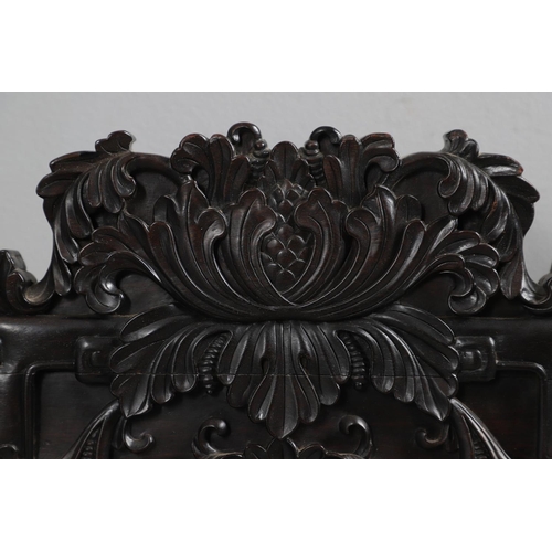 463 - AN EARLY 20TH CENTURY CHINESE CARVED HARDWOOD HEADBOARD. predominantly rosewood and other hardwood, ... 