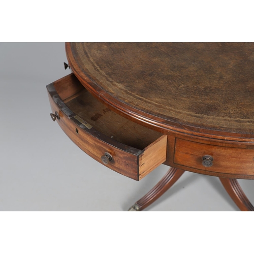 464 - A REGENCY STYLE MAHOGANY DRUM TABLE. late 19th/early 20th century, the leather inset top with gilt t... 