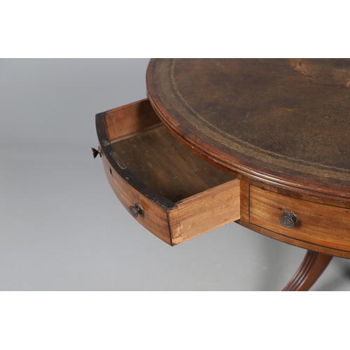 464 - A REGENCY STYLE MAHOGANY DRUM TABLE. late 19th/early 20th century, the leather inset top with gilt t... 