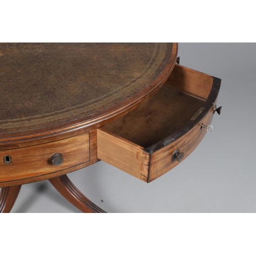 464 - A REGENCY STYLE MAHOGANY DRUM TABLE. late 19th/early 20th century, the leather inset top with gilt t... 