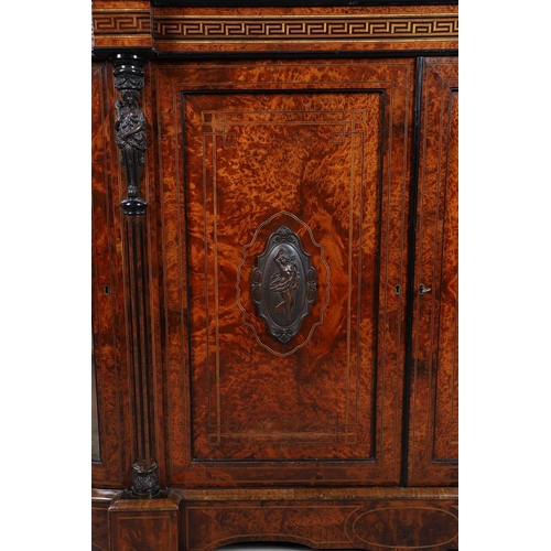 465 - A VICTORIAN WALNUT, AMBOYNA & PARQUETRY INLAID CREDENZA. Circa 1870, of bowed outline, the walnut fi... 