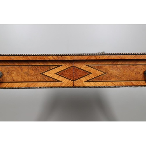 466 - A KINGWOOD AND BURR WALNUT INLAID WRITING TABLE BY HOLLAND AND SONS. late 19th century, the gilt too... 