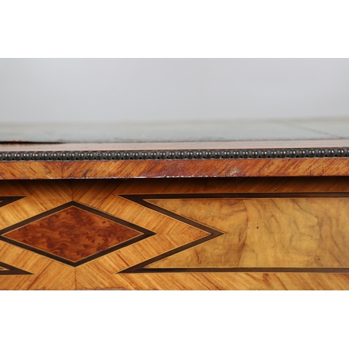 466 - A KINGWOOD AND BURR WALNUT INLAID WRITING TABLE BY HOLLAND AND SONS. late 19th century, the gilt too... 