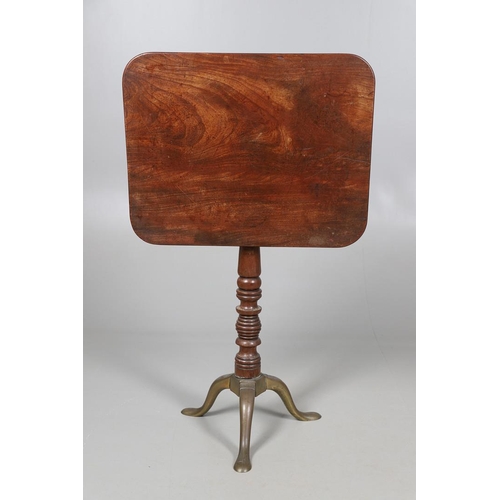 467 - A GEORGE III MAHOGANY TRIPOD TABLE. the rectangular tilt top with reeded edge upon a multiple ring t... 