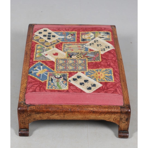 468 - A VICTORIAN OAK AND WOOLWORK FOOTSTOOL. the drop-in woolwork seat with unusual pack of cards design ... 