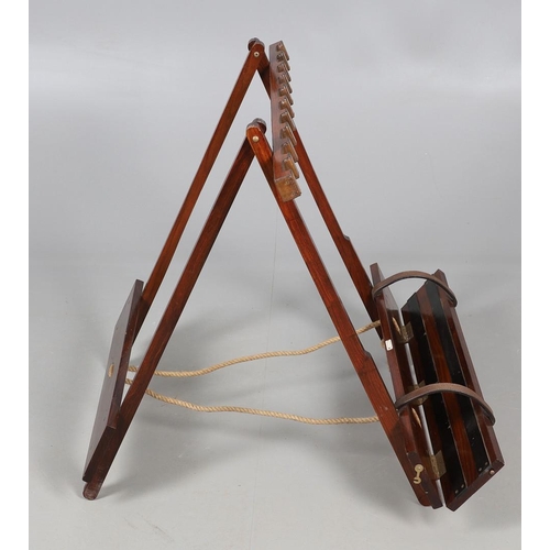 472 - A PORTABLE TEAK GUN RACK BY JOHN ORMISTON. labelled 